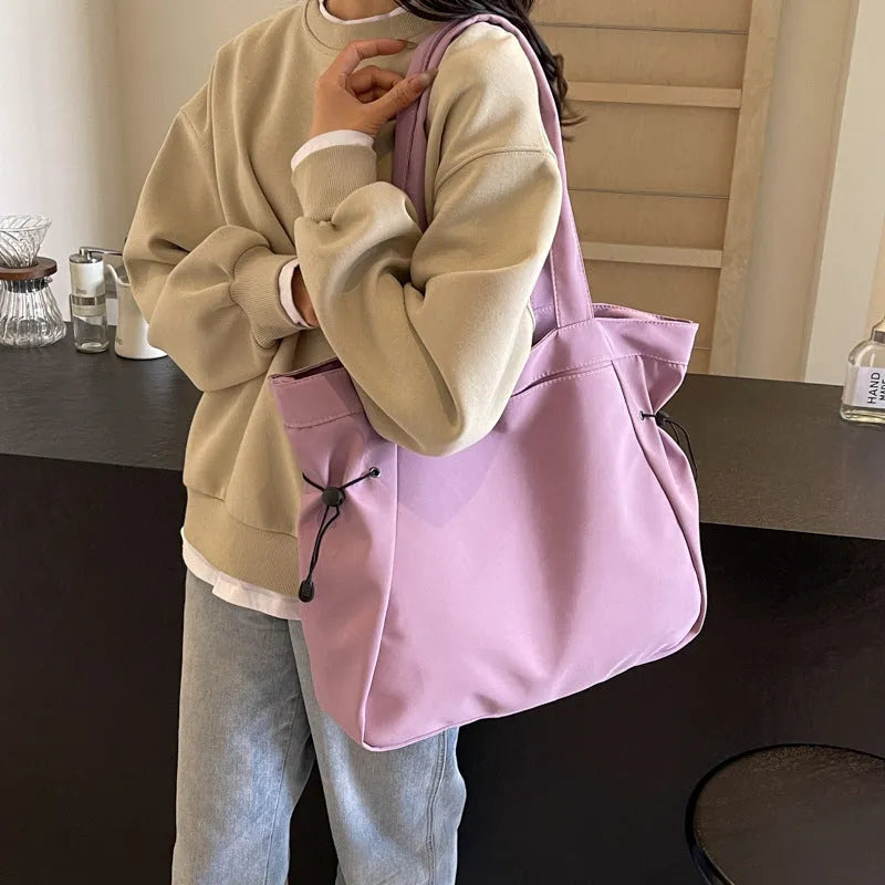 Soft foldable Oxford cloth women's shoulder tote bag shown in available colours: black, brown, dark grey, light grey, purple.