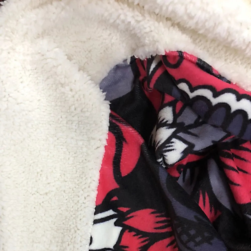 Round coral fleece burrito blanket with food print, shown wrapped.