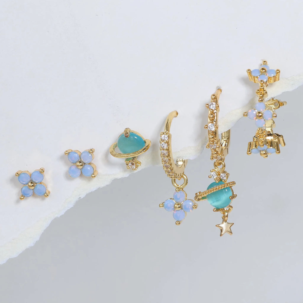 Gold and silver flower nail design ear studs with zircon mosaic accents in Japanese Korean style
