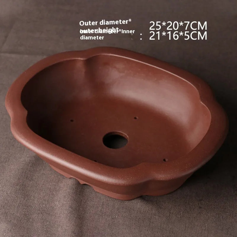 Handmade purple clay bonsai basin in classical Chinese style measuring 25cm long by 20cm wide