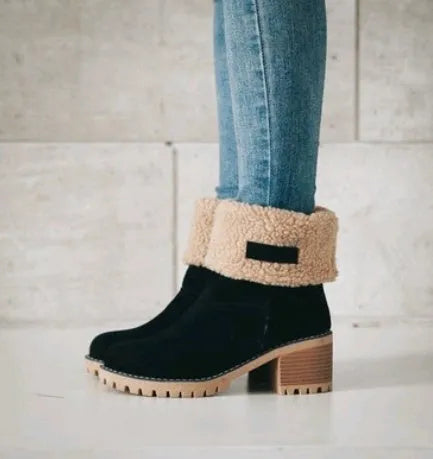 Women's mid-calf suede snow boots with a low heel and round toe in multiple colour options.