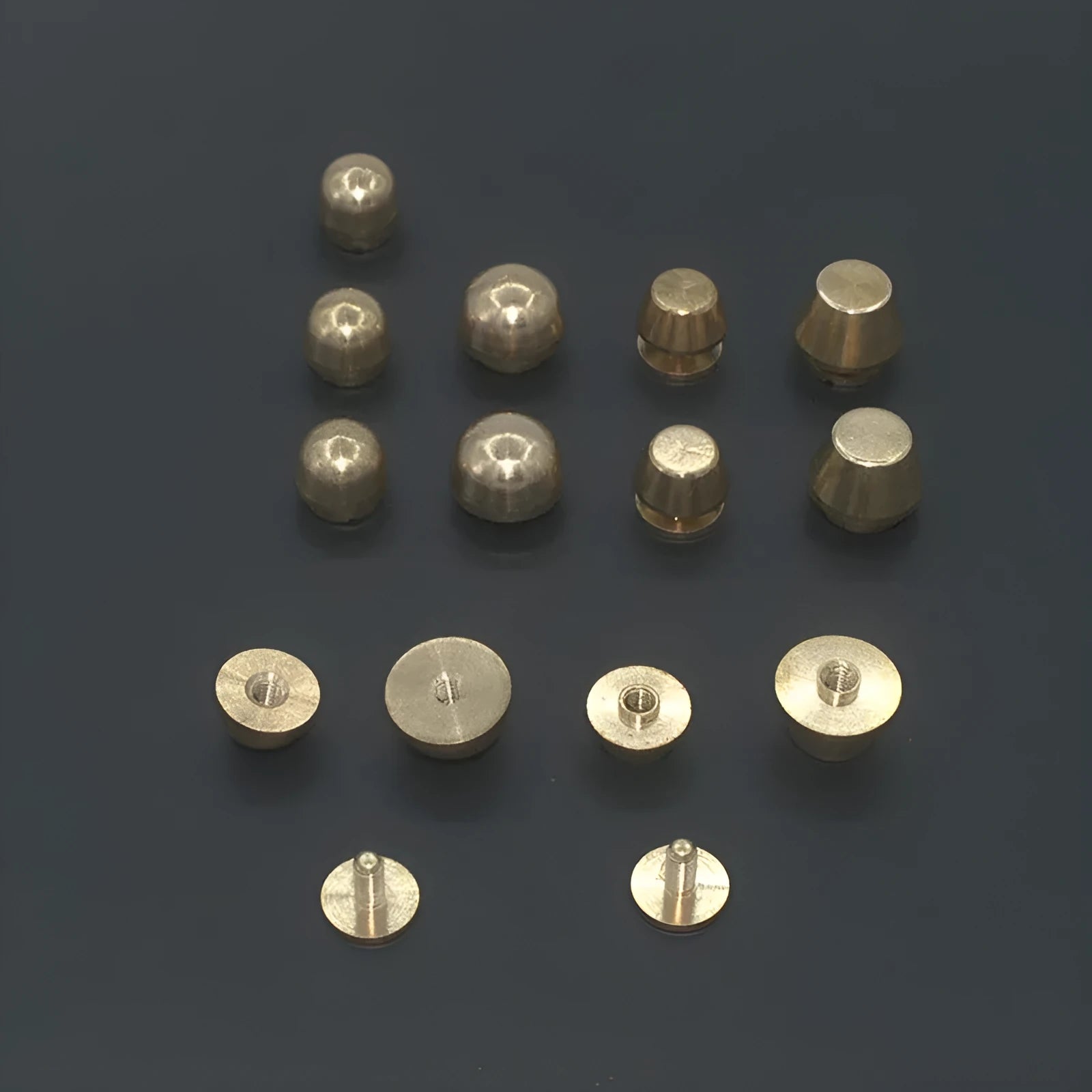 Brass decorative belt buckle showing round and bucket foot nail shapes in 10x6mm and 12x7mm sizes.