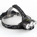 Fixed focus LED head torch for outdoor camping with long-range illumination.