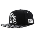 Cotton baseball cap with letter embroidery in black or white with adjustable strap