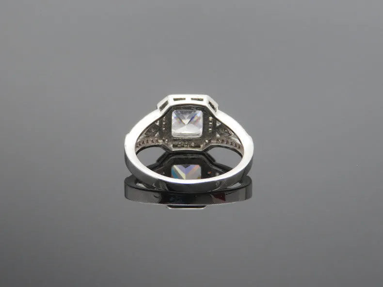 Geometric hollow zircon ring in platinum colour showing quadrilateral pattern design