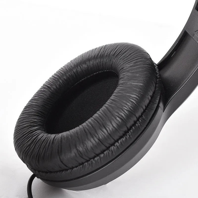 Fully enclosed headworn monitoring earphones in black industrial style, one pair