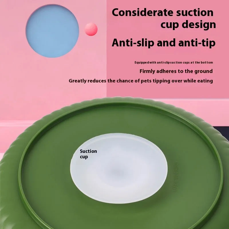 Plastic pet bowl with a central silicone slow feeder mat in a windmill pattern, shown in blue.