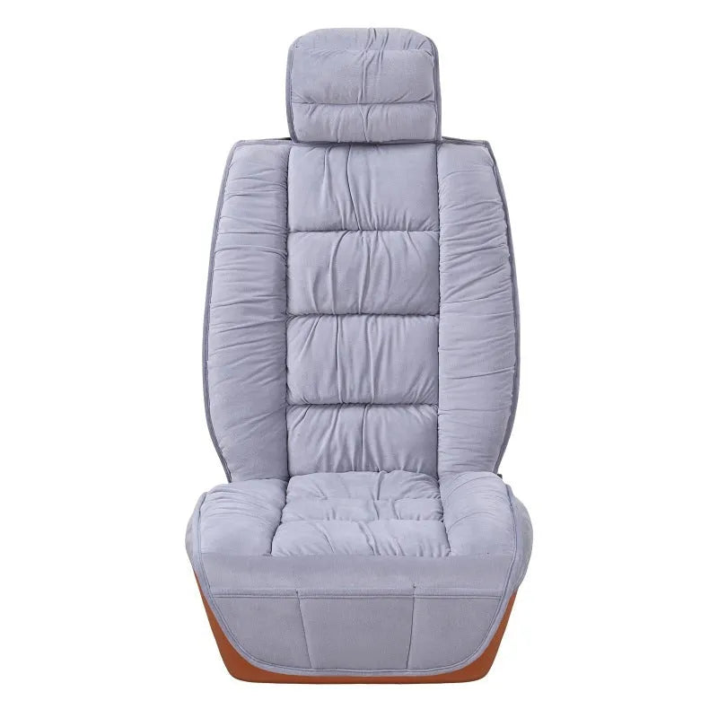 Plush winter car seat cushion shown in a grey set, with soft texture and fitting on a car seat.