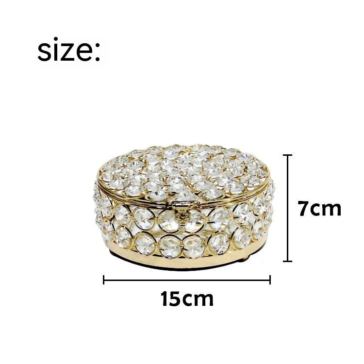 French gold metal jewellery box with transparent crystal glass panels showing jewellery inside