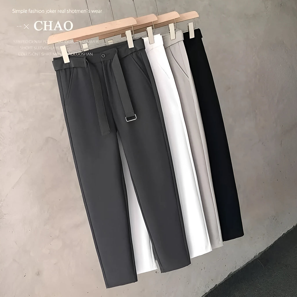 Boys slim straight wool trousers in a tapered cut with a straight leg opening.