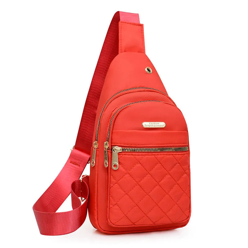 Girls' crossbody sports chest bag in Oxford cloth with plaid design, shown in a dark blue colour.