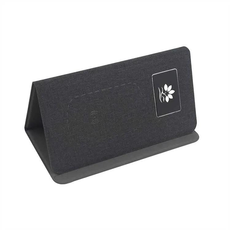 Folding wireless charging mouse pad set with luminous features and wireless mouse on desk