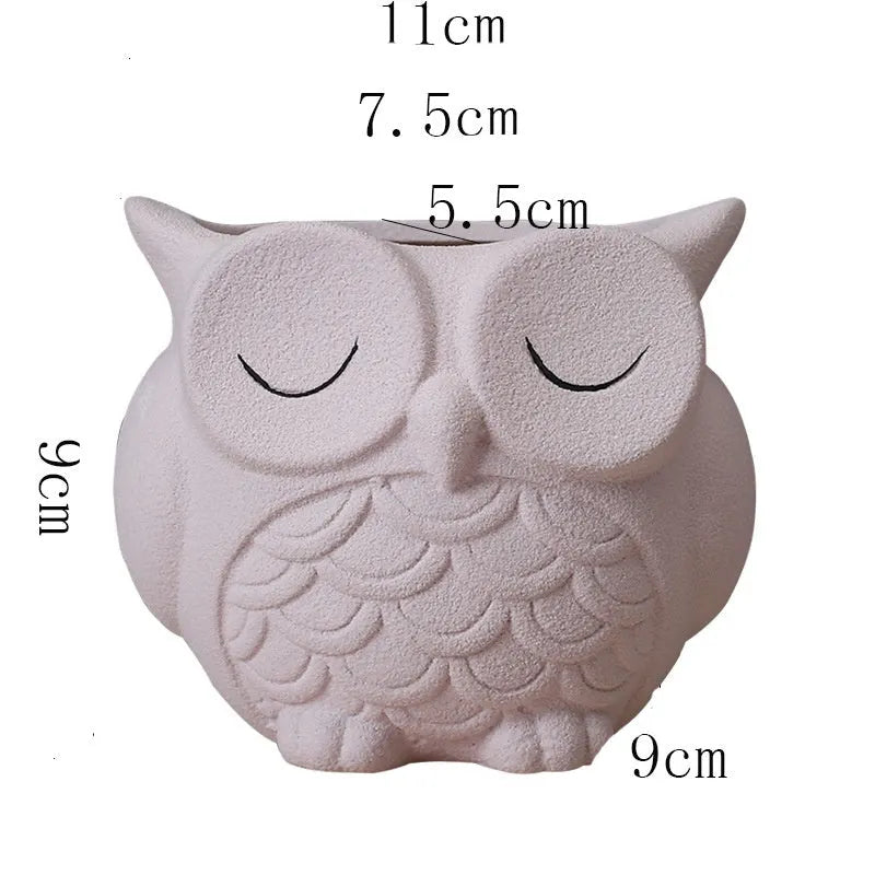 Handmade frosted ceramic flower pot with a cartoon owl design for succulents.
