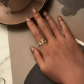 Silver corgi pet ring on a finger, showing cartoon animal design and adjustable band.
