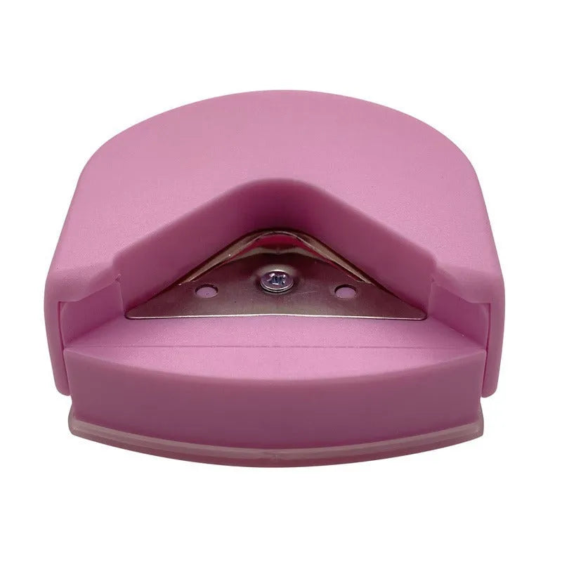 Corner cutter for paper cards and photos, plastic and metal, 5.8cm by 5.4cm by 2.5cm, in black, pink, or blue