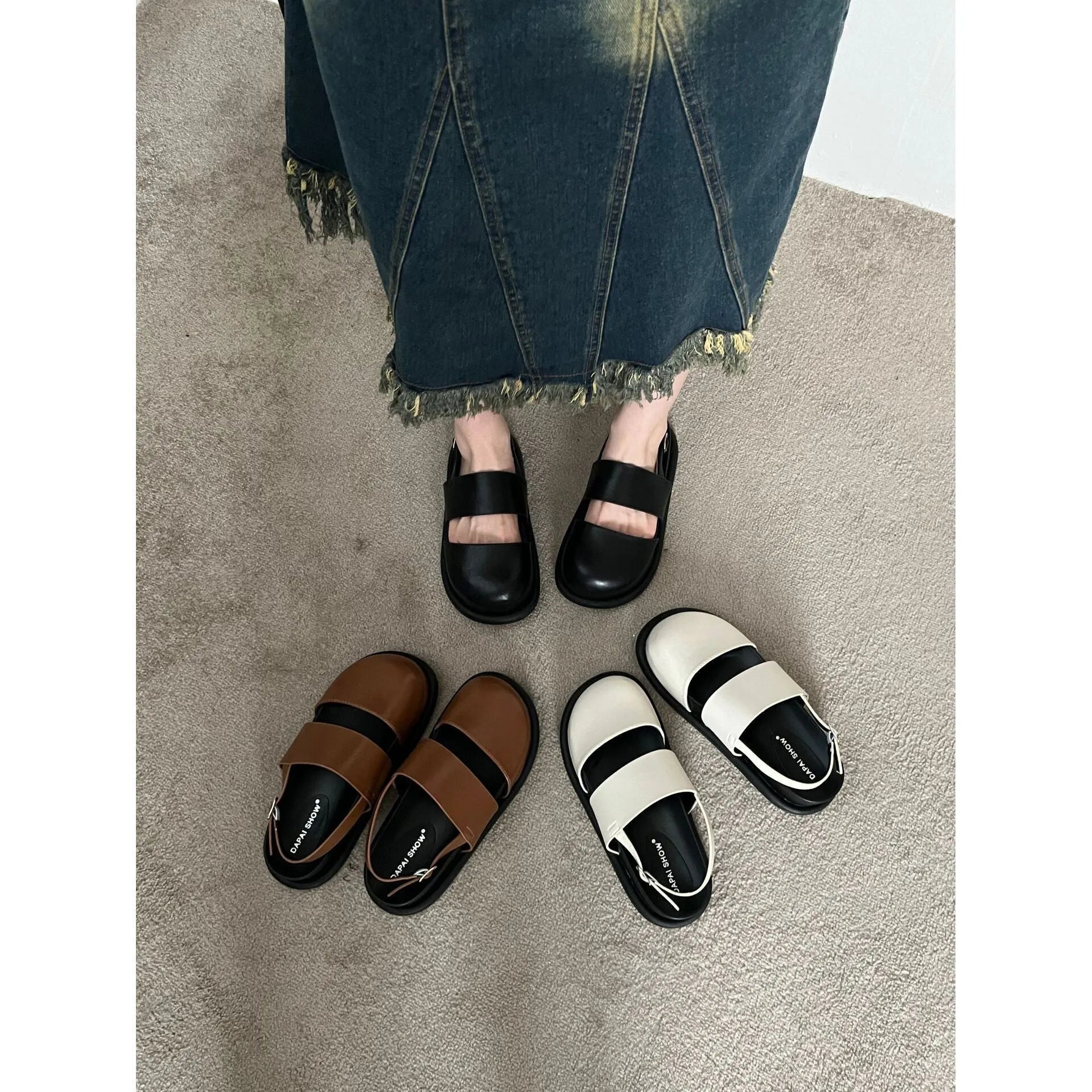 Retro closed-toe sandals with an adjustable ankle strap buckle in black, brown, or apricot colour.
