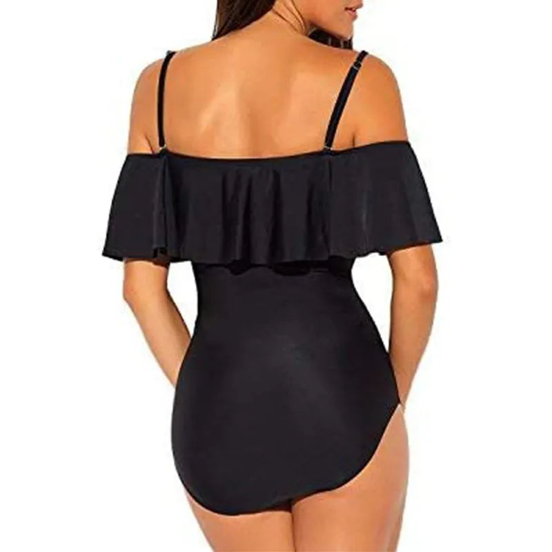 Black one-piece swimsuit with ruffled halter strap and side cut-out details
