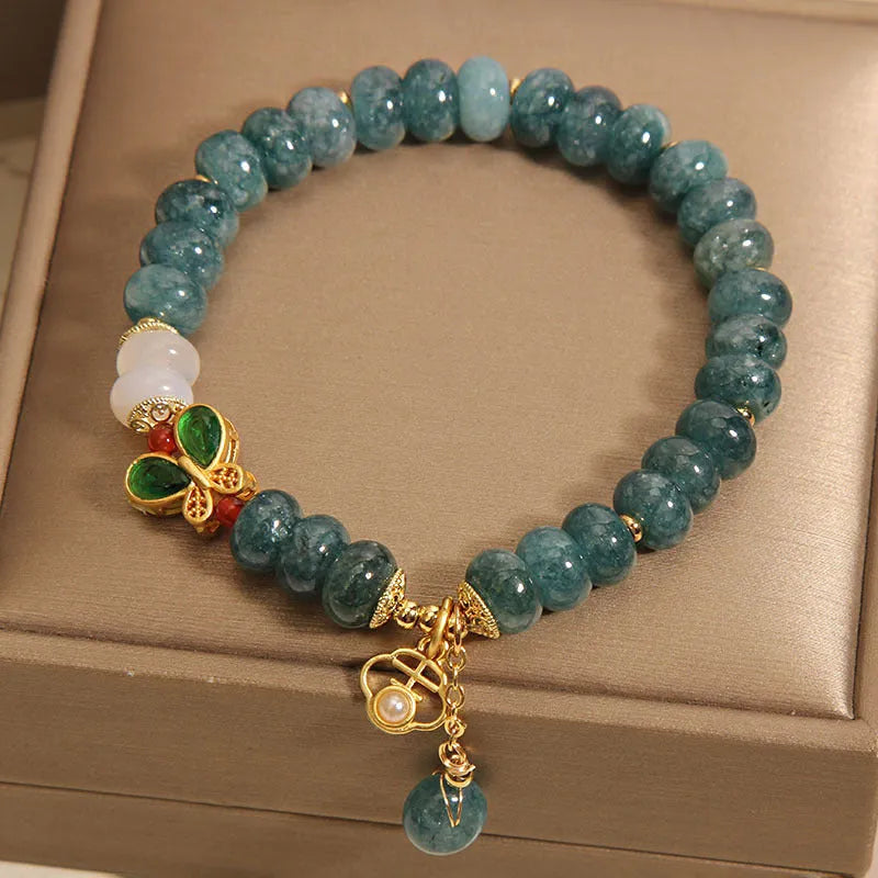 Blue water jade beads crystal bracelet with alloy inlay and abacus design elements