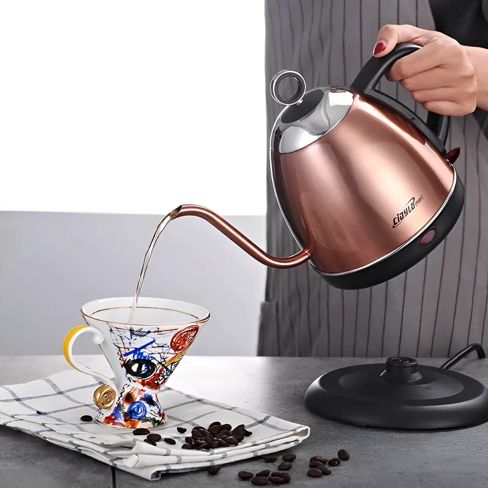 Stainless steel automatic constant temperature kettle in gold colour with touch control panel