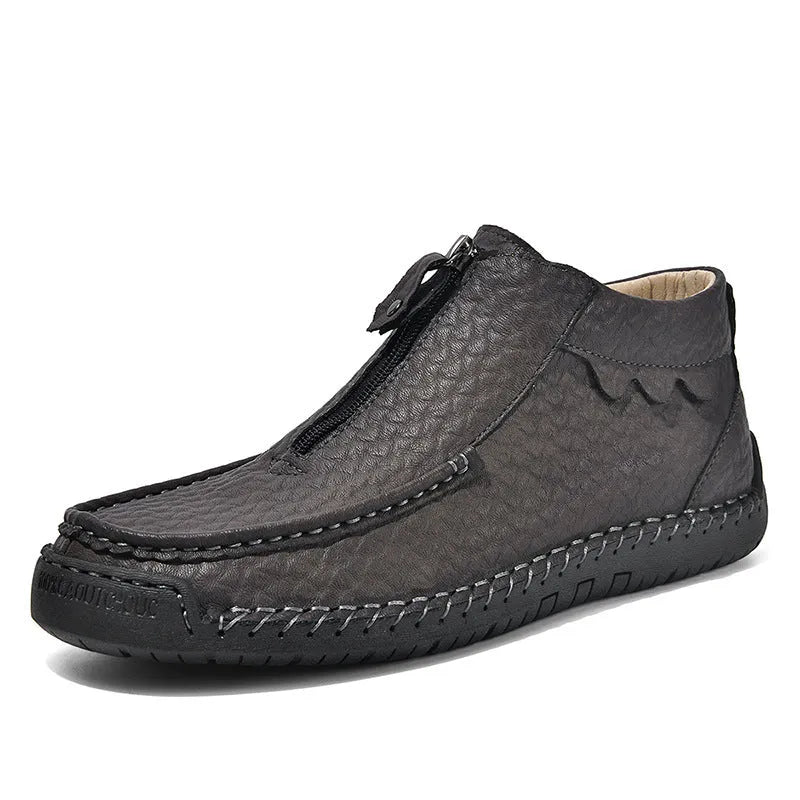 Men's black slip-on casual loafers with a round toe and rubber sole on a white background.