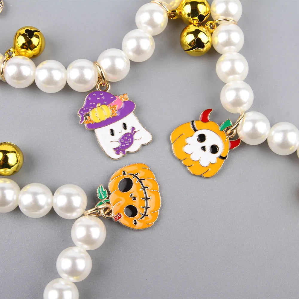 Purple Halloween cat collar decoration with simulated pearl necklace and pumpkin charm design