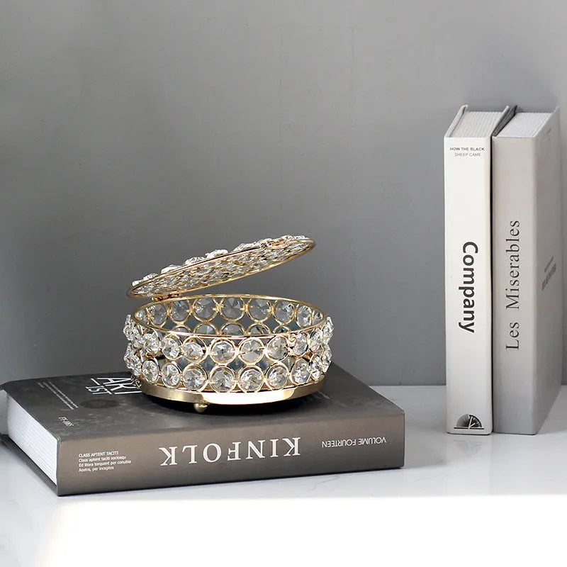 French gold metal jewellery box with transparent crystal glass panels showing jewellery inside