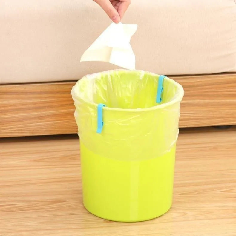Polypropylene garbage bag fixing clip for holding bin liners securely to trash can sides.