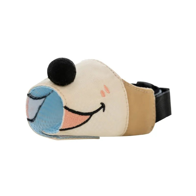 Canvas dog muzzle in Ollie Brown Bear colour, shown next to size chart for S, M, L, and XL.