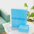 Pack of white pet urinal pads showing size options S, M, L, XL for dogs and cats.