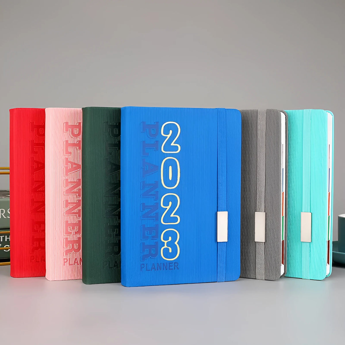 Creative student almanac diary with imitation leather cover, open to show Daolin paper pages.