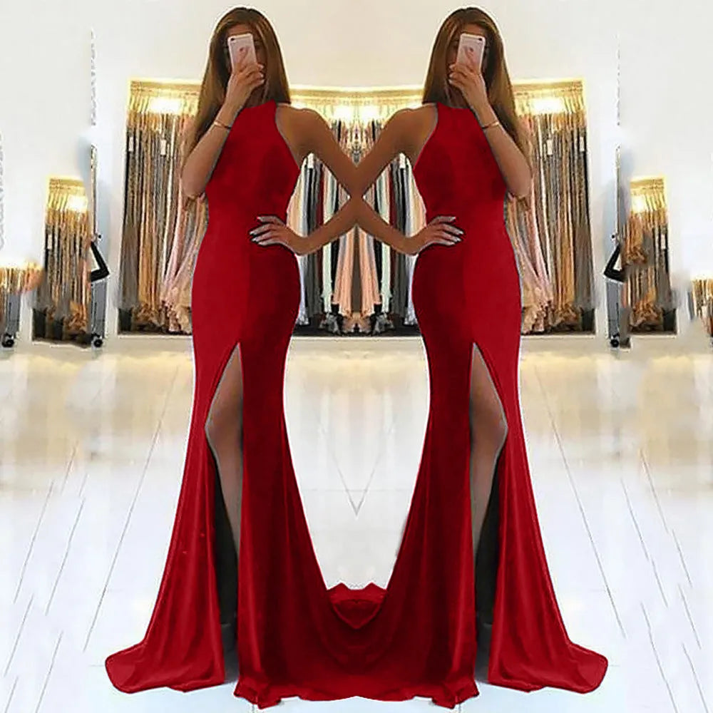 Long red evening dress with hollow details, high waist, and large swing skirt