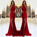 Long red evening dress with hollow details, high waist, and large swing skirt