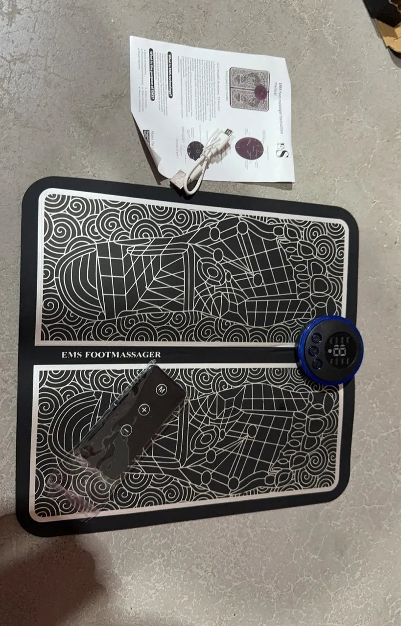 Pulse micro-current foot massage cushion in English style colour with remote control on leather surface