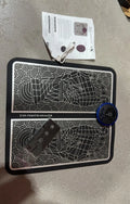 Pulse micro-current foot massage cushion in English style colour with remote control on leather surface