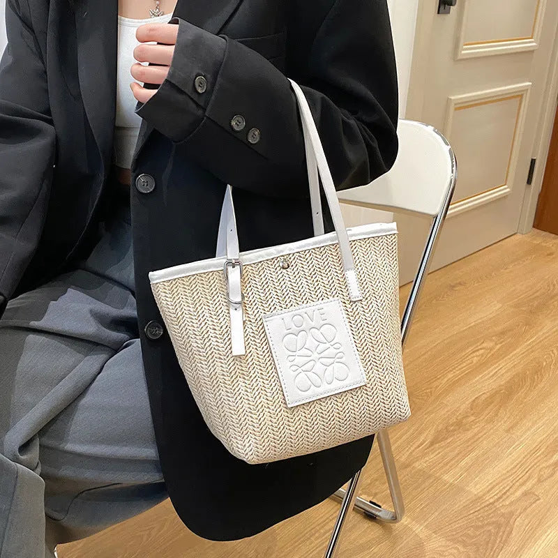 Spring straw woven women's large capacity shoulder bag in European American retro style with three-dimensional pocket