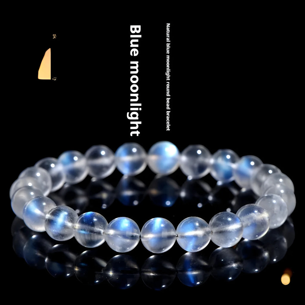 Natural cream body blue moonlight crystal bracelet showing simple design and crystal details.