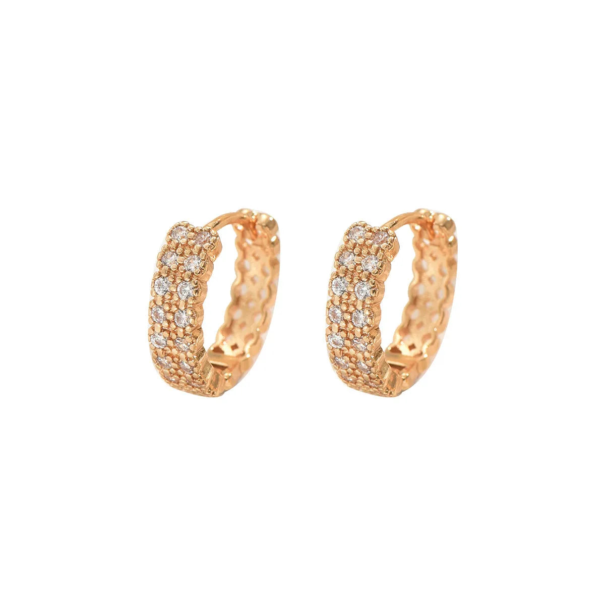 Copper geometry pattern ear studs with round, dot, and ring design elements.