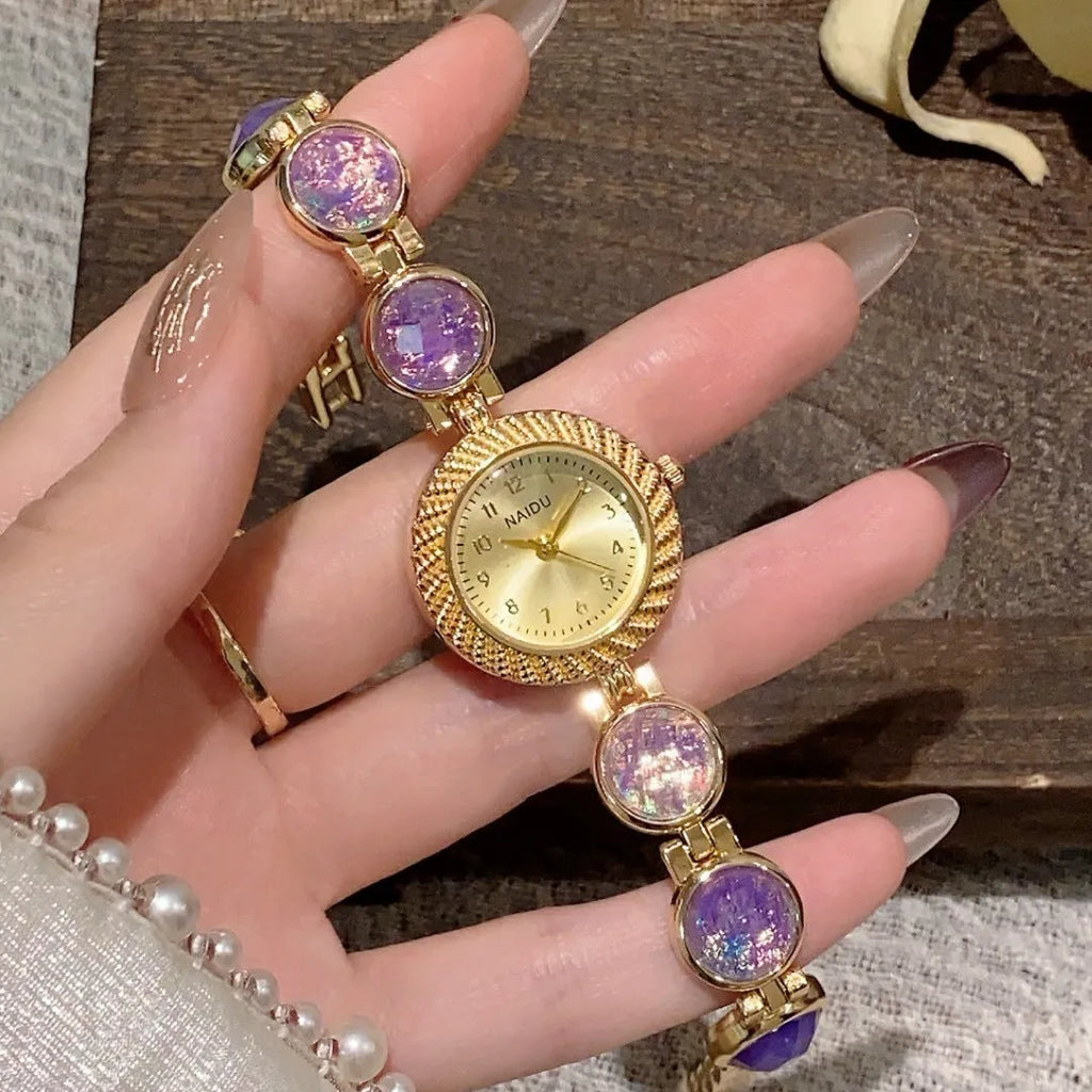 Women's quartz watch with a round 25mm dial in a choice of six colours on a wrist.