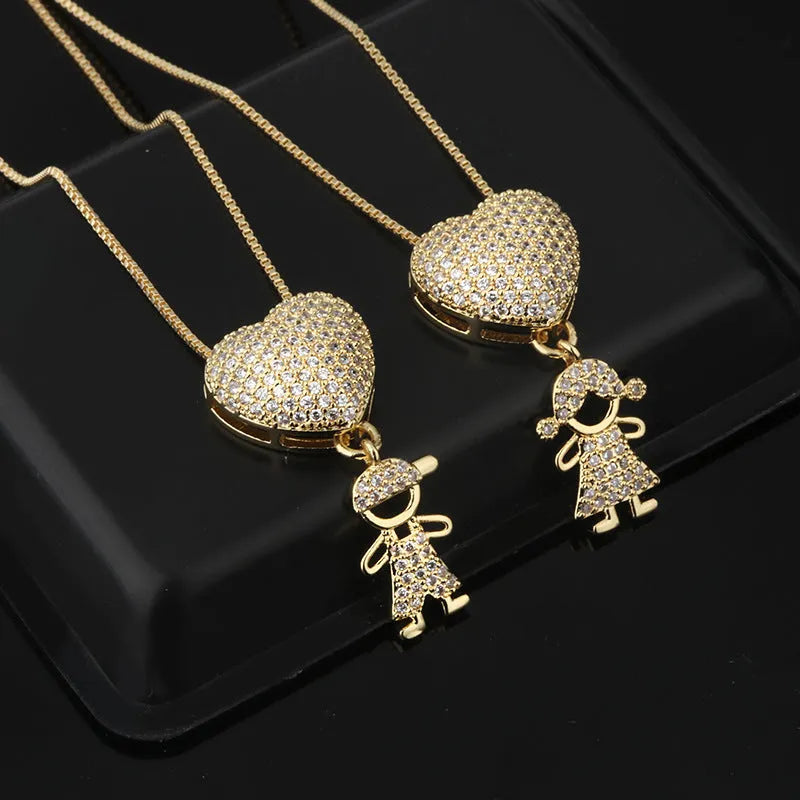 Gold colour copper family heart necklace with cubic zirconia inlay and boy girl motif pendant