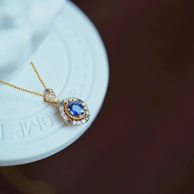 Royal style gold necklace with mixed gemstone pendant on adjustable copper box chain