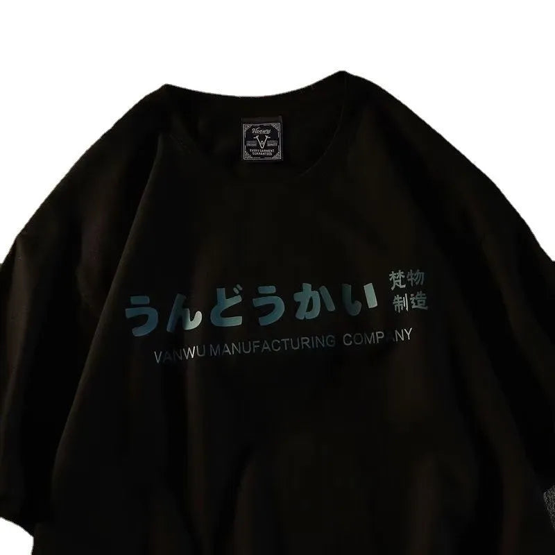 Loose fit short sleeve cotton T-shirt in dark grey on a hanger.