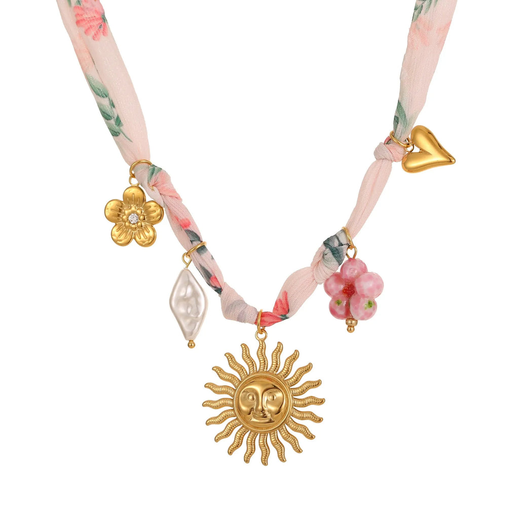 Stainless steel women's necklace with sun pendant on adjustable chain