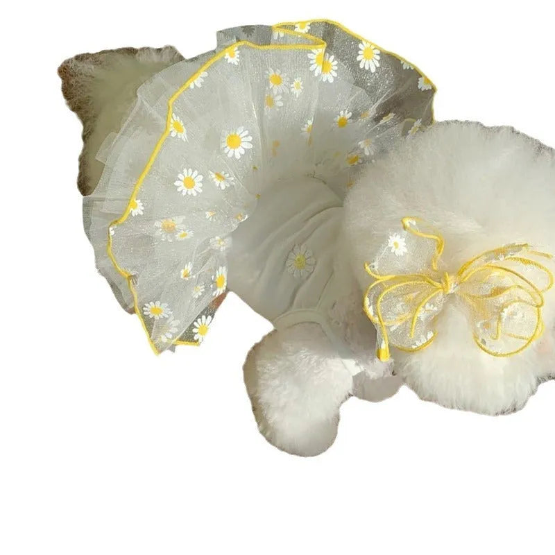 Yellow daisy patterned polyester dog summer clothes shown in size options from XS to XL