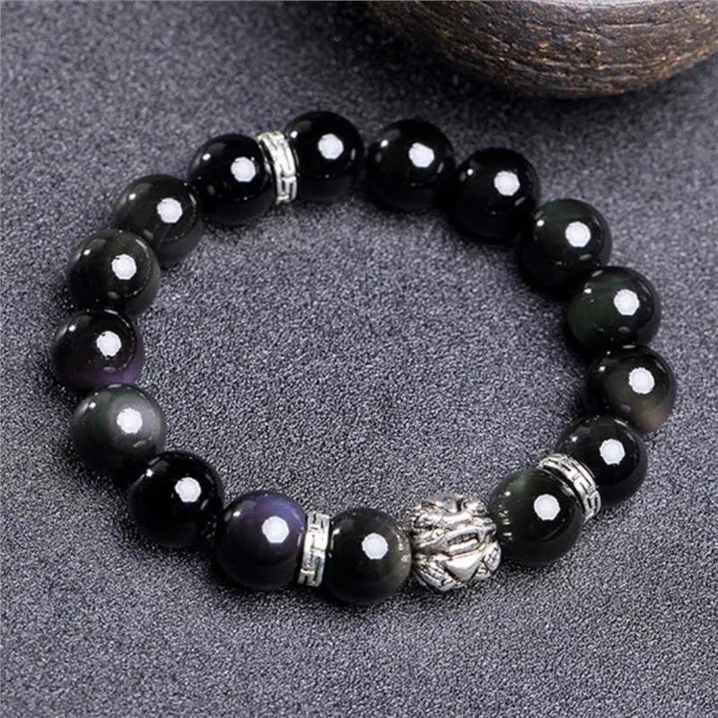Natural obsidian bracelet with 999 silver components in male 12mm and female 10mm sizing options
