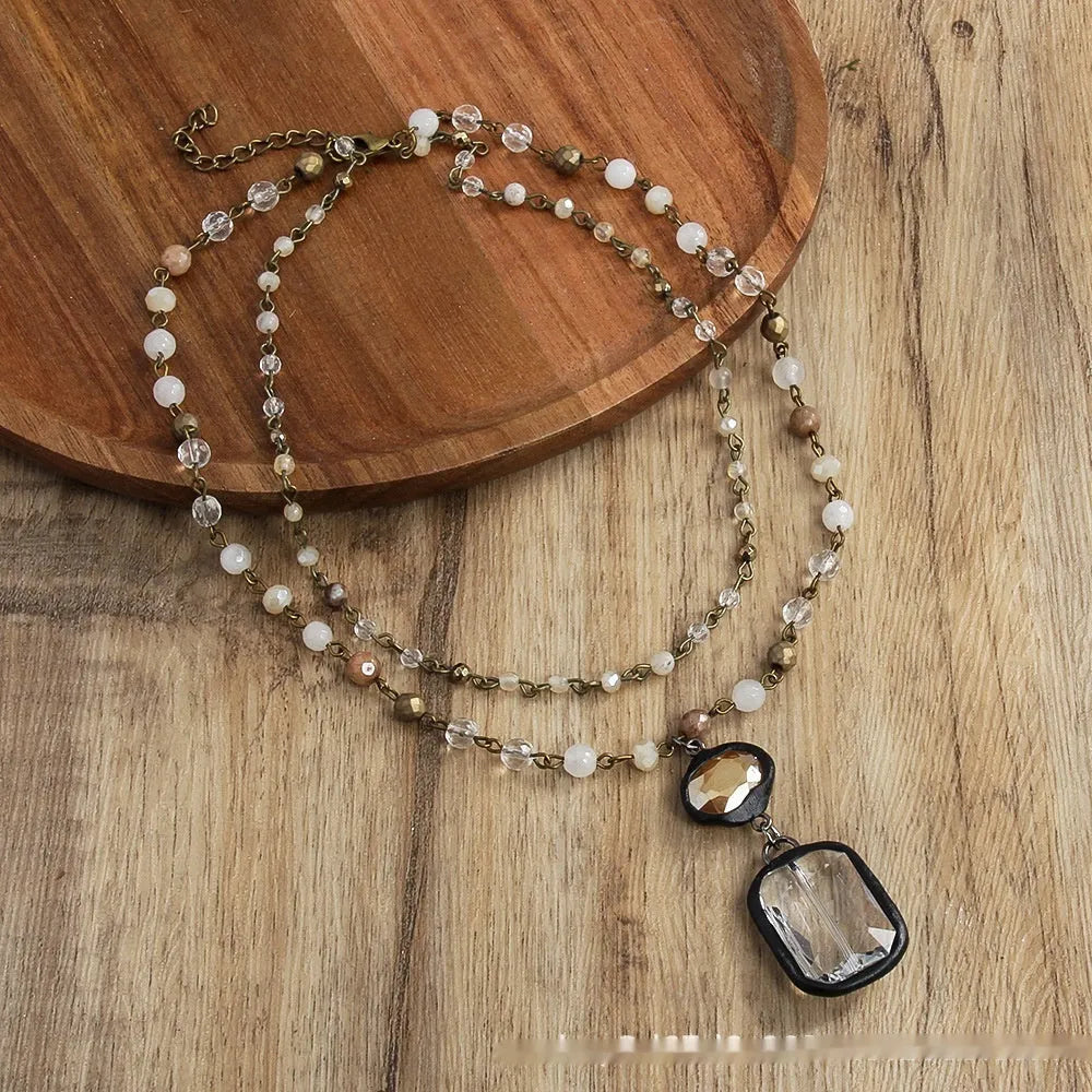 Tribal style necklace with stone and glass pendant on adjustable alloy chain in retro design