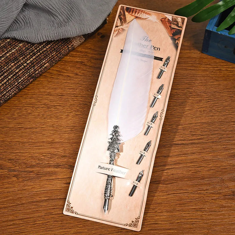 Vintage feather dip pen in multiple colours with zinc alloy construction measuring 30 cm length