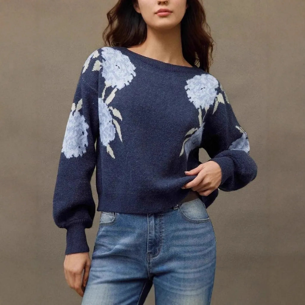 Sapphire blue women's loose pullover with woven floral jacquard pattern and off-neck design.