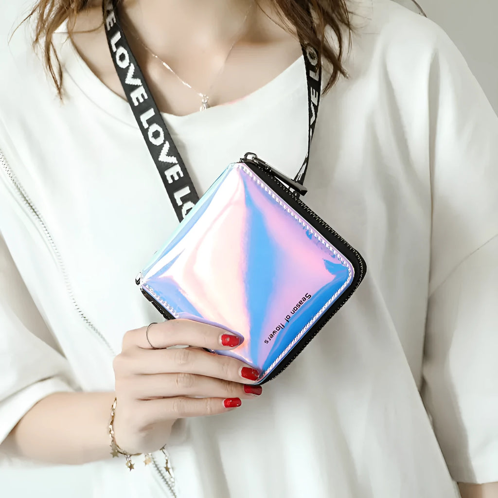 Short folding women's wallet in PU leather showing crystal blue, glitter and green colour options