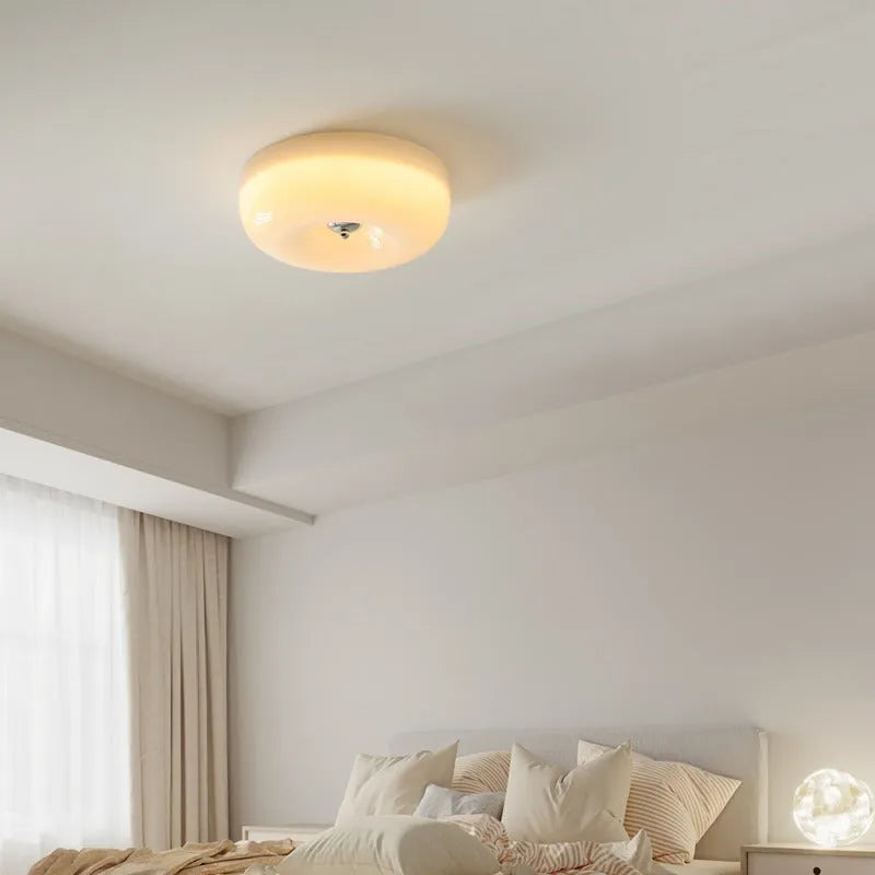 American style cream coloured bedroom ceiling light fixture with three-colour settings.