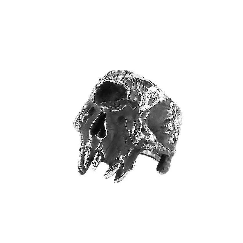 Alloy skull ring with one-eyed design in silver electroplated finish shown on finger